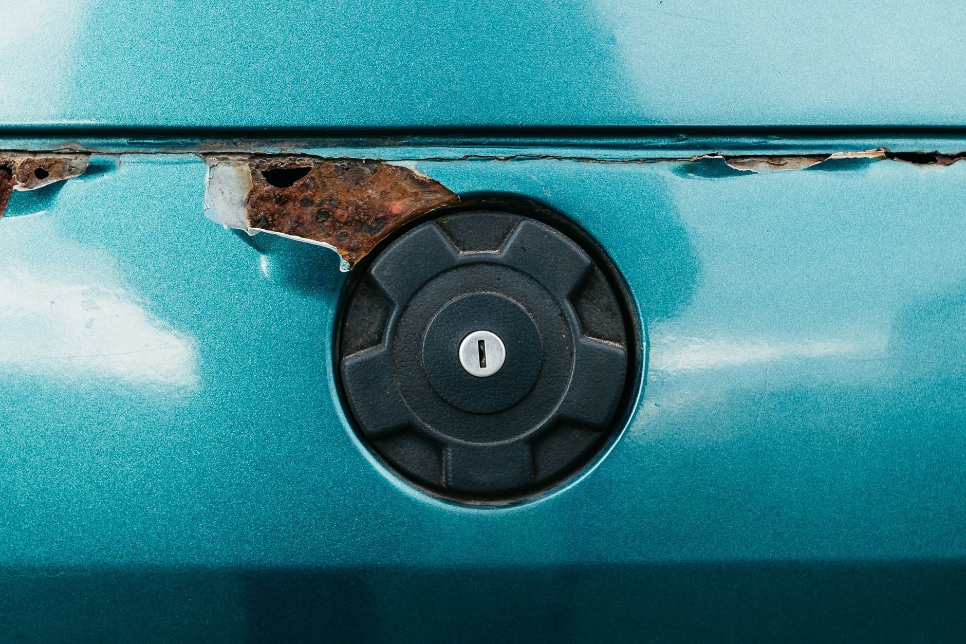 Close-up of a retro car fuel cap — the kind of precision detail Flektare protects.